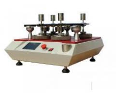 Four-headed fabric flat grinding instrument